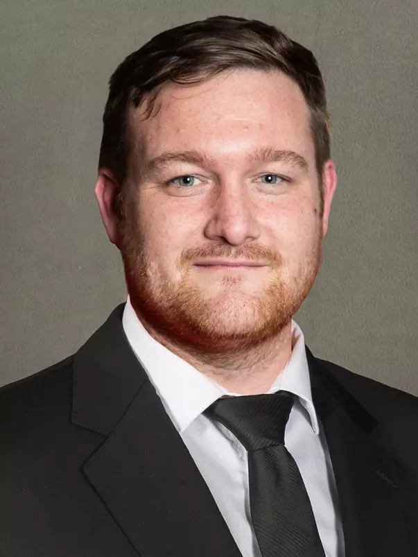 Headshot of Ty McGuire, lacrosse assistant coach