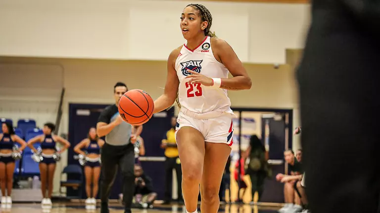 Owls top Bearcats 51-41 in Thanksgiving Classic opener