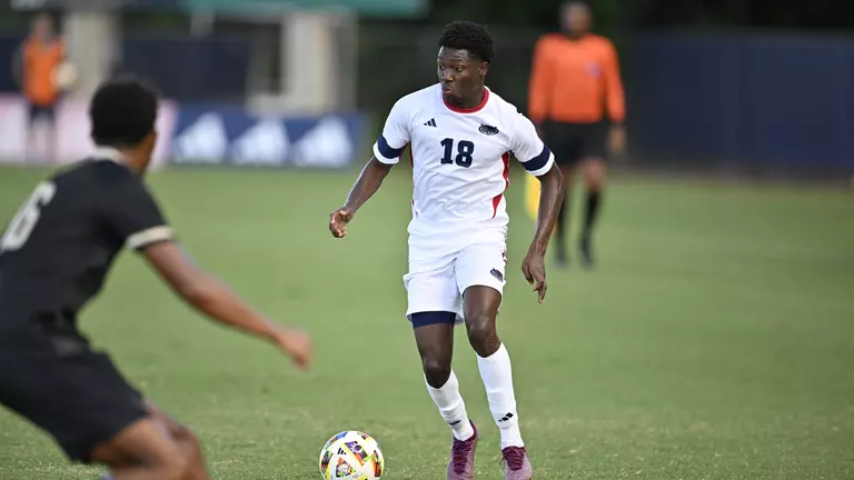 Owls Ambush USF, Earn First AAC Win