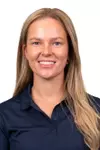 CHAMPAIGN, IL - August 20, 2023 - Illinois Assistant Coach Julie Hovland headshot taken during 2023 Olympic Sport Headshot Day in the Hall of Fame room of Bielfeldt Athletics Administration Building in Champaign, IL. Photo By Kevin Snyder