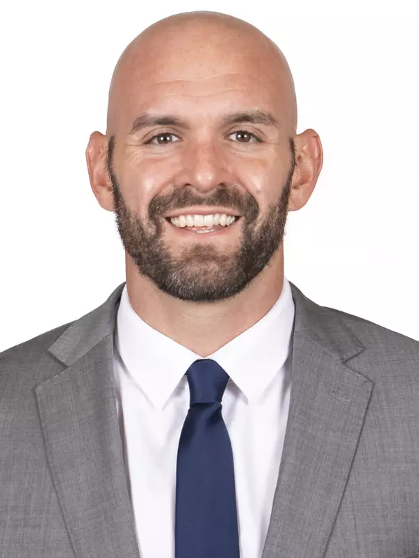 CHAMPAIGN, IL - September 29, 2023 - Illinois Strength & Conditioning Coach Adam Fletcher headshot taken during 2023-2024 Team Photo Photoshoot at Ubben Basketball Complex in Champaign, IL. Photo By Kevin Snyder