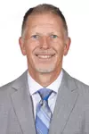 CHAMPAIGN, IL - September 29, 2023 - Illinois Athletic Trainer Paul Schmidt headshot taken during 2023-2024 Team Photo Photoshoot at Ubben Basketball Complex in Champaign, IL. Photo By Kevin Snyder