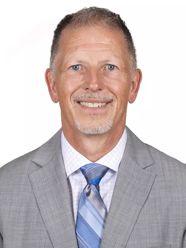 CHAMPAIGN, IL - September 29, 2023 - Illinois Athletic Trainer Paul Schmidt headshot taken during 2023-2024 Team Photo Photoshoot at Ubben Basketball Complex in Champaign, IL. Photo By Kevin Snyder