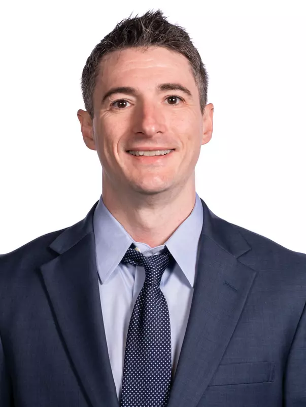 CHAMPAIGN, IL- February 06, 2024 - Illinois Assistant Coach Tim McNeil headshot taken at the Bielfeldt Athletics Administration Building in Champaign, IL. Photo By Kevin Snyder