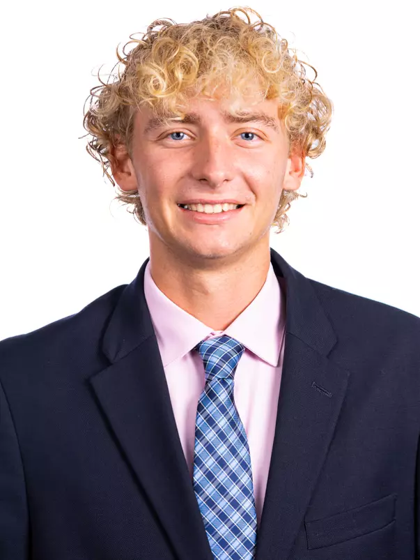 Champaign, IL - August 25, 2024 - Illinois Men's Tennis Player Tyler Bowers headshot taken during 2024 Olympic Sports Headshot Day at Bielfeldt Athletics Administration Building in Champaign, IL. (Photo By Kevin Snyder/Illinois Athletics)