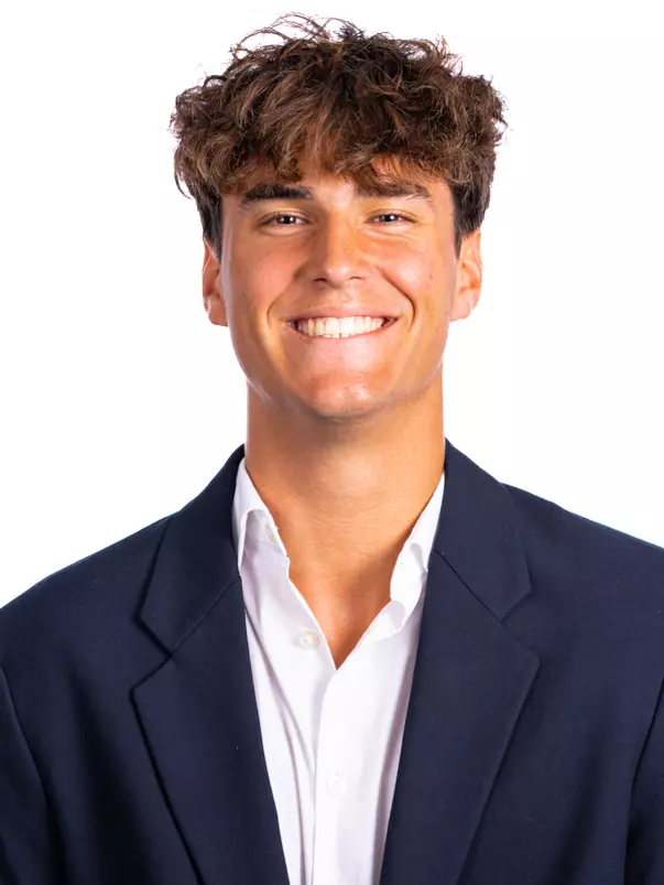 Champaign, IL - August 25, 2024 - Illinois Men's Tennis Player Mathis Debru headshot taken during 2024 Olympic Sports Headshot Day at Bielfeldt Athletics Administration Building in Champaign, IL. (Photo By Kevin Snyder/Illinois Athletics)
