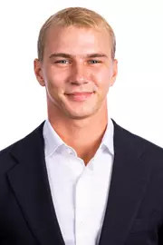 Champaign, IL - August 25, 2024 - Illinois Men's Tennis Player Gabrielius Guzauskas headshot taken during 2024 Olympic Sports Headshot Day at Bielfeldt Athletics Administration Building in Champaign, IL. (Photo By Kevin Snyder/Illinois Athletics)