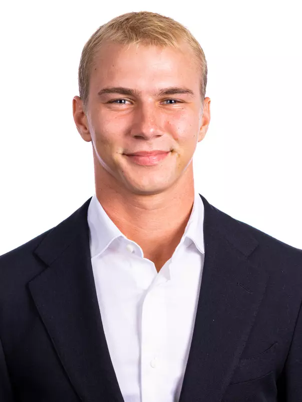 Champaign, IL - August 25, 2024 - Illinois Men's Tennis Player Gabrielius Guzauskas headshot taken during 2024 Olympic Sports Headshot Day at Bielfeldt Athletics Administration Building in Champaign, IL. (Photo By Kevin Snyder/Illinois Athletics)