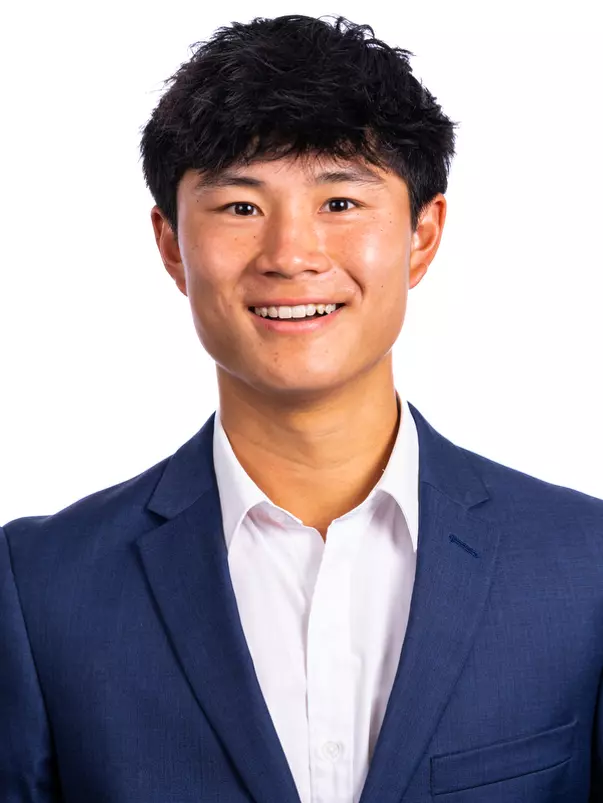 Champaign, IL - August 25, 2024 - Illinois Men's Tennis Player Jeremy Zhang headshot taken during 2024 Olympic Sports Headshot Day at Bielfeldt Athletics Administration Building in Champaign, IL. (Photo By Kevin Snyder/Illinois Athletics)