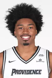 Men's basketball player Jacob Bannarbie head shot