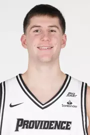 Men's basketball player Ryan Mela head shot