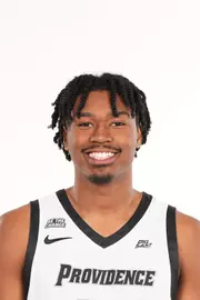 Men's basketball player Jacob Bannarbie head shot
