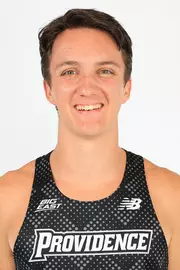 Men's cross country and track runner Adam Wedlake head shot