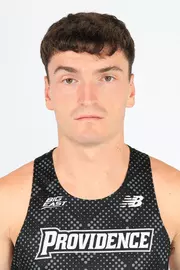 Men's cross country and track runner Cormac Dixon head shot