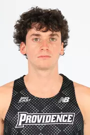 Men's cross country and track runner Elliott Pugh head shot