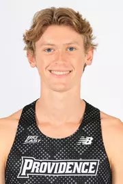 Men's cross country and track runner Jeb Hillary head shot