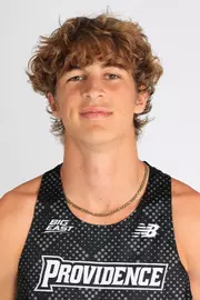 Men's track runner Tom Breen head shot