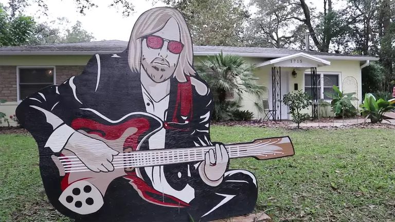 Wooden Tom Petty sign outside his home in Gainesville