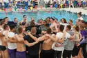 team chant before meet