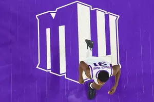 Mountain West logo on court