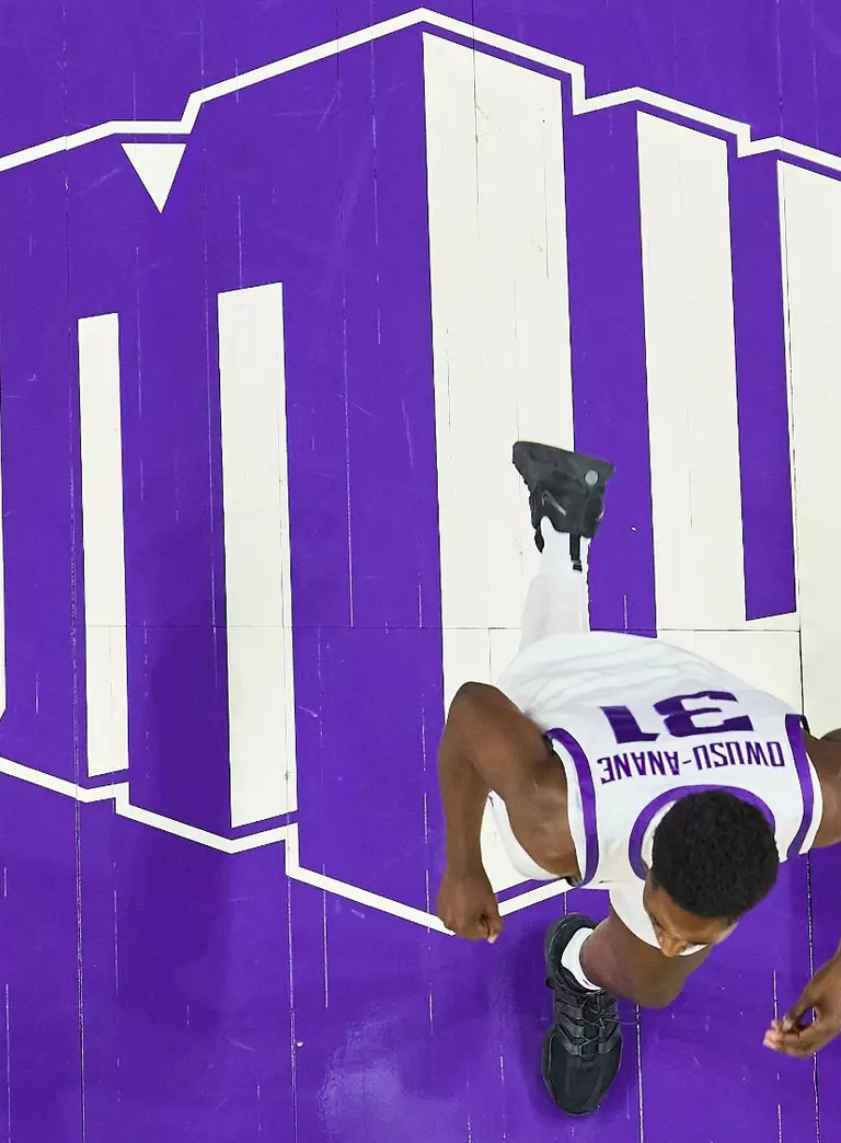 Mountain West logo on court