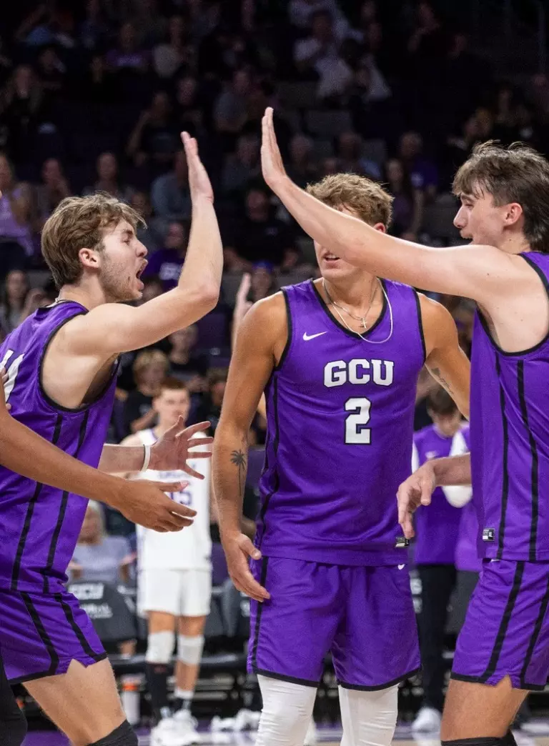 team celebration after defeating ucla