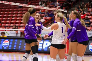 team celebrates after big point