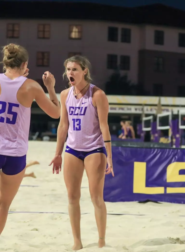 rhea and mae celebrating after win