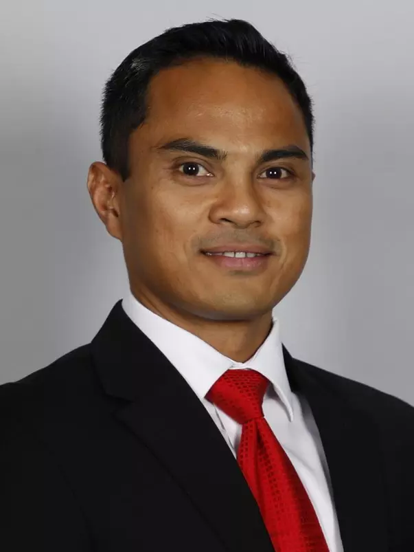 Georgia GymDog coach Doug Contaoi poses for a portrait in Stegeman Coliseum in Athens, Ga., on Friday, Aug., 24, 2018. (Photo by Kristin M. Bradshaw)