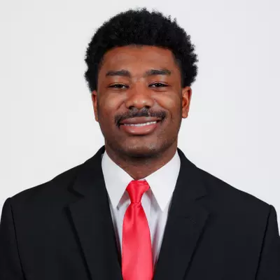 Sacovie White-Helton headshot