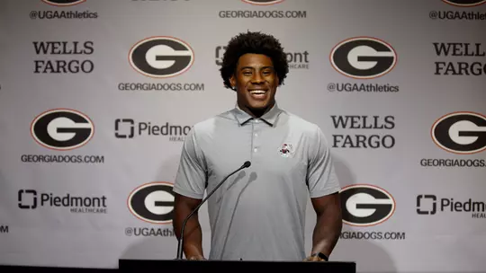 Justin Williams at podium