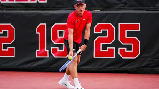 Noah Johnston during an NCAA match in Athens against Elon.