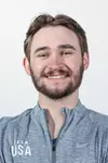 Rylan Kissell Headshot with an Army gray pullover