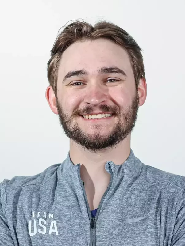 Rylan Kissell Headshot with an Army gray pullover