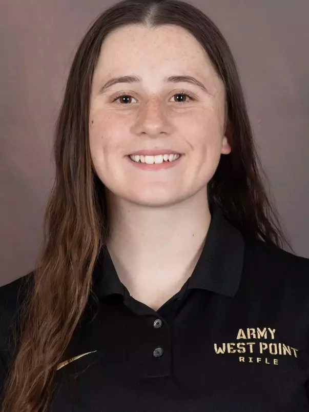 Ashton Arlington Headshot with a black Army West Point Polo on.