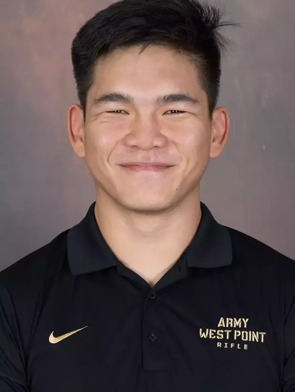 Bohan Yang Headshot with a black Army West Point Polo on.