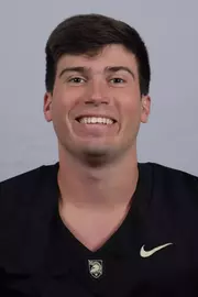Anderson Britton headshot with a Black Army Football jersey on.