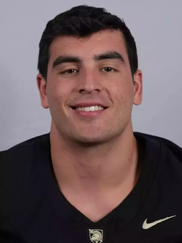 Andon Thomas headshot with a Black Army Football jersey on.