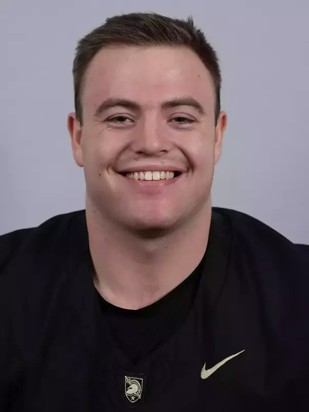 Braden Bartosh headshot with a Black Army Football jersey on.