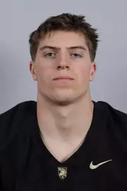 Brady Anderson headshot with a Black Army Football jersey on.