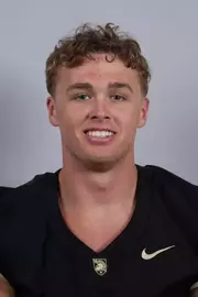 Brady Mott headshot with a Black Army Football jersey on.