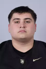 Brady Small headshot with a Black Army Football jersey on.
