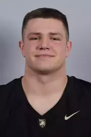 Braeden Helmkamp headshot with a Black Army Football jersey on.