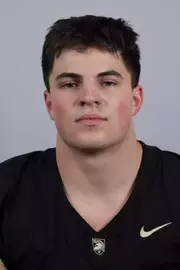Brennen Fisher headshot with a Black Army Football jersey on.