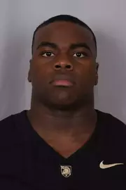 Bryson Banks headshot with a Black Army Football jersey on.