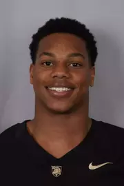 Bryson Luter headshot with a Black Army Football jersey on.