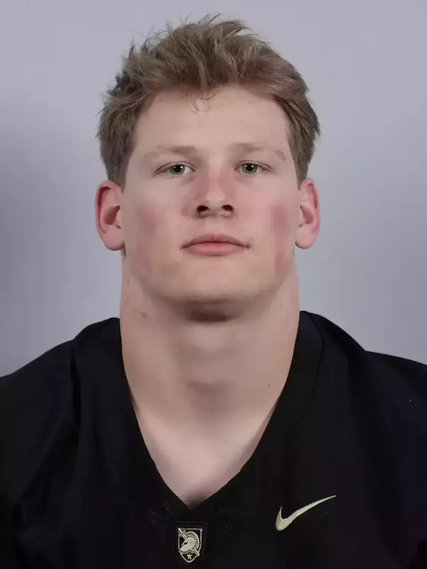 Carson Smith headshot with a Black Army Football jersey on.