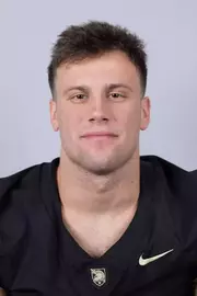 Cale Hellums headshot with a Black Army Football jersey on.