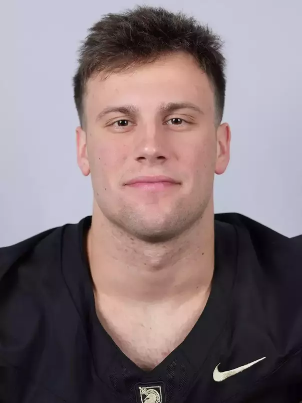 Cale Hellums headshot with a Black Army Football jersey on.