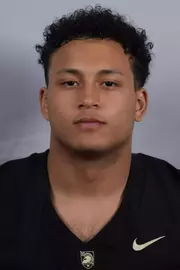 Chris Williams headshot with a Black Army Football jersey on.